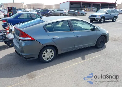 2014 Honda Insight from USA, damaged, VIN JHMZE2H37ES001644